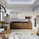 Cuisine contemporaine lumineuse avec îlot central, façades bois et blanches, grandes baies vitrées et espace repas intégré.