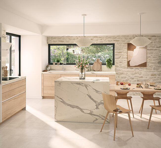 Cuisine équipée moderne ixina avec îlot central et espace repas convivial
